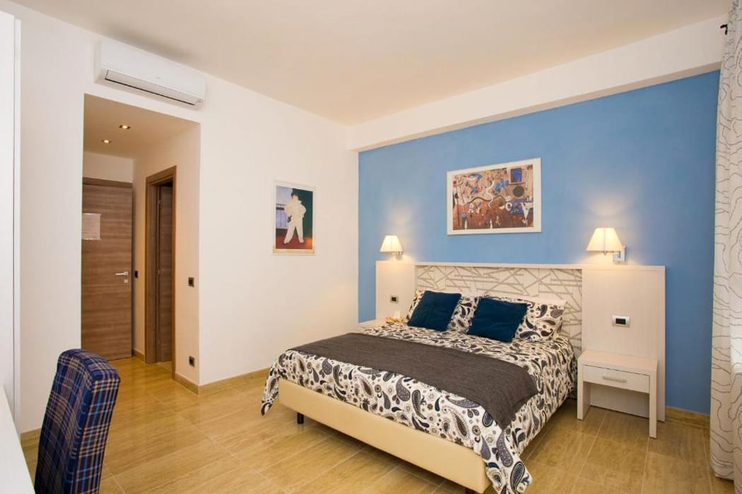 Schlafzimmer-Ferienwohnung-in-Rom-Trastevere